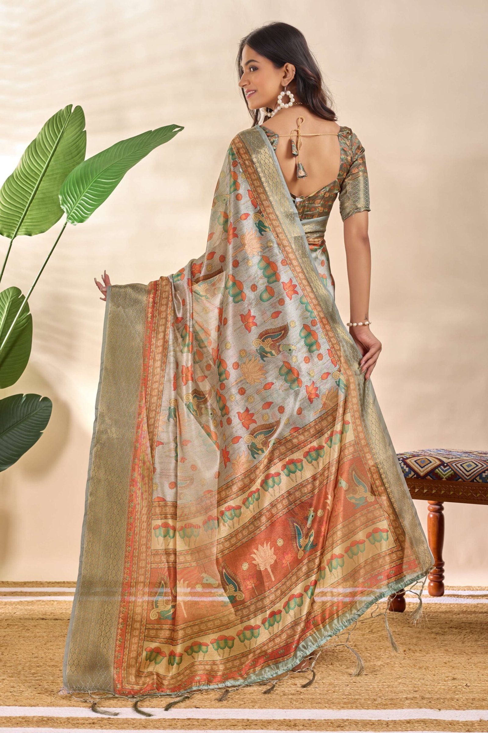 Royal Soft Silk Saree with Zari Border & Lotus Peacock Print