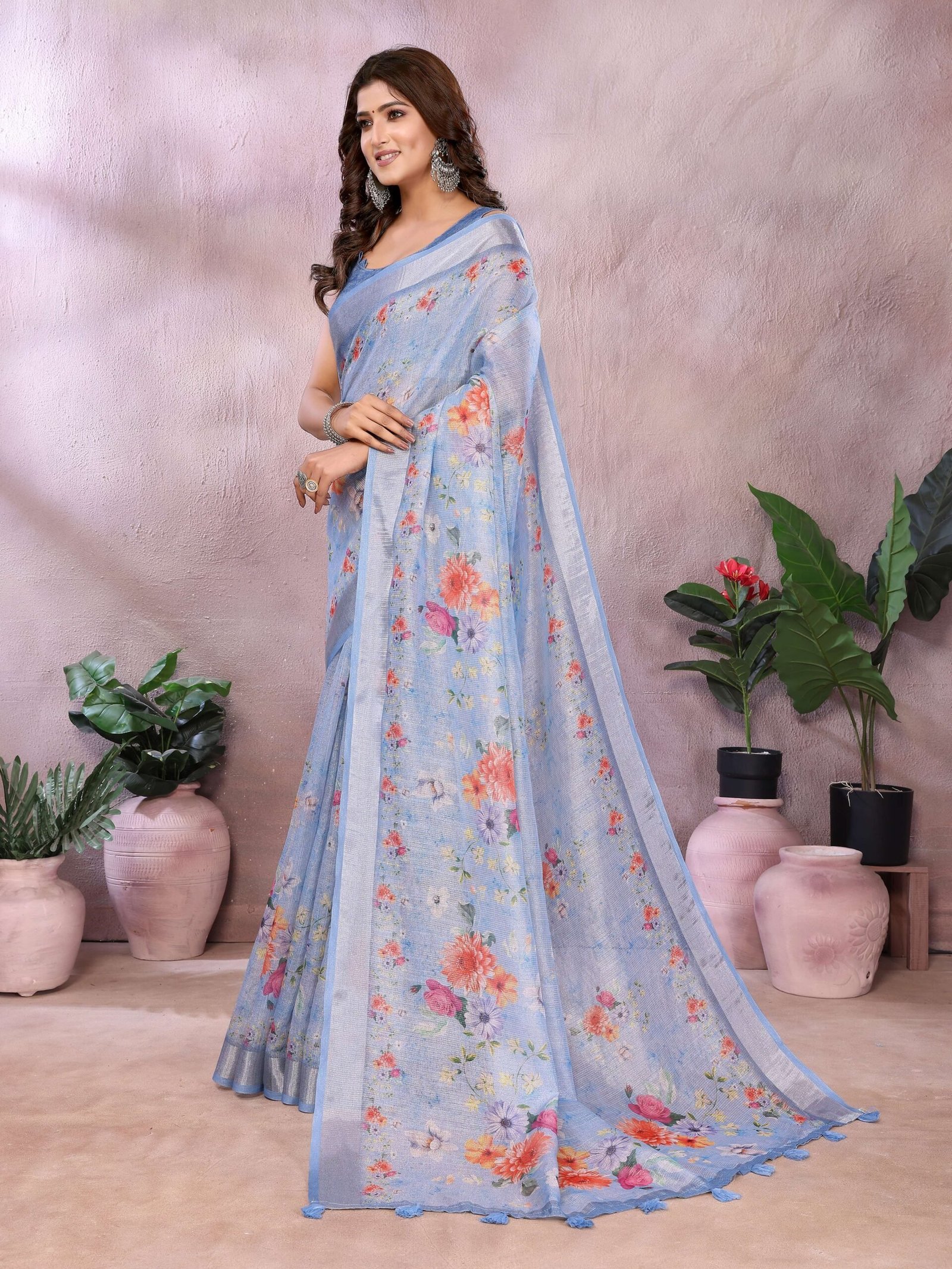 Serene Sky Blue Floral Printed Linen Shimmer Saree with Tassel Accents