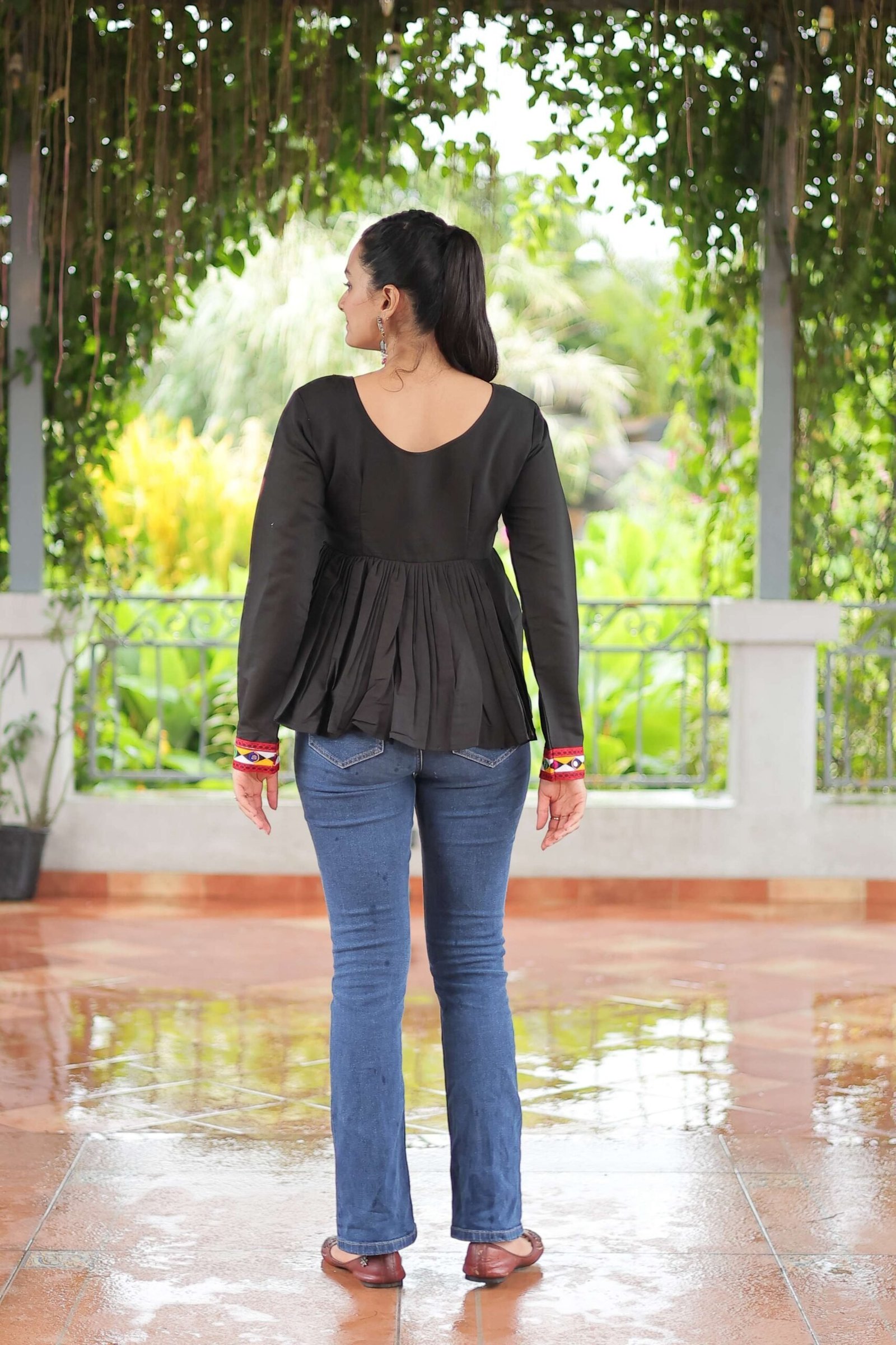Black Navratri Special Black Peplum Top in Roman Fabric with Kutchi Gamthi Work ? Festive Ethnic Wear