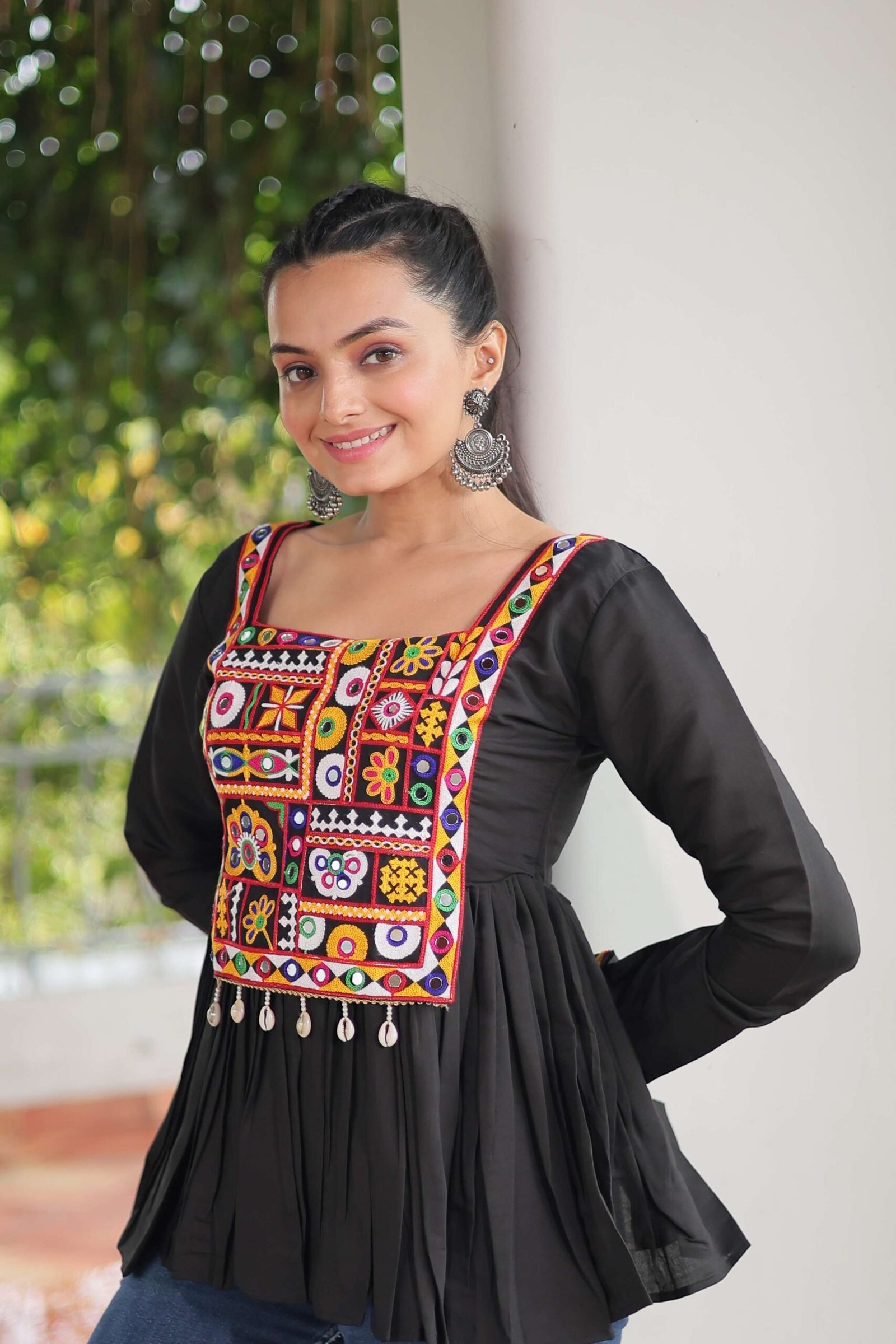 Black Navratri Special Black Peplum Top in Roman Fabric with Kutchi Gamthi Work ? Festive Ethnic Wear