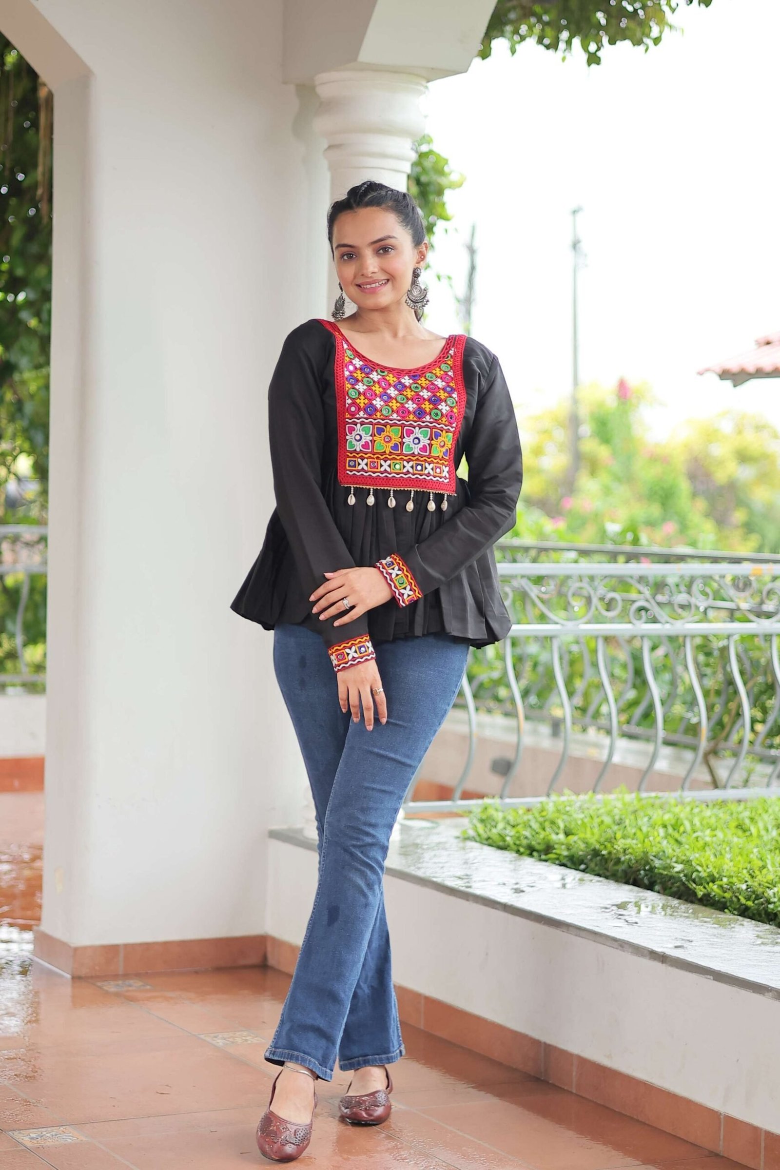 Black Navratri Special Black Peplum Top in Roman Fabric with Kutchi Gamthi Work ? Festive Ethnic Wear