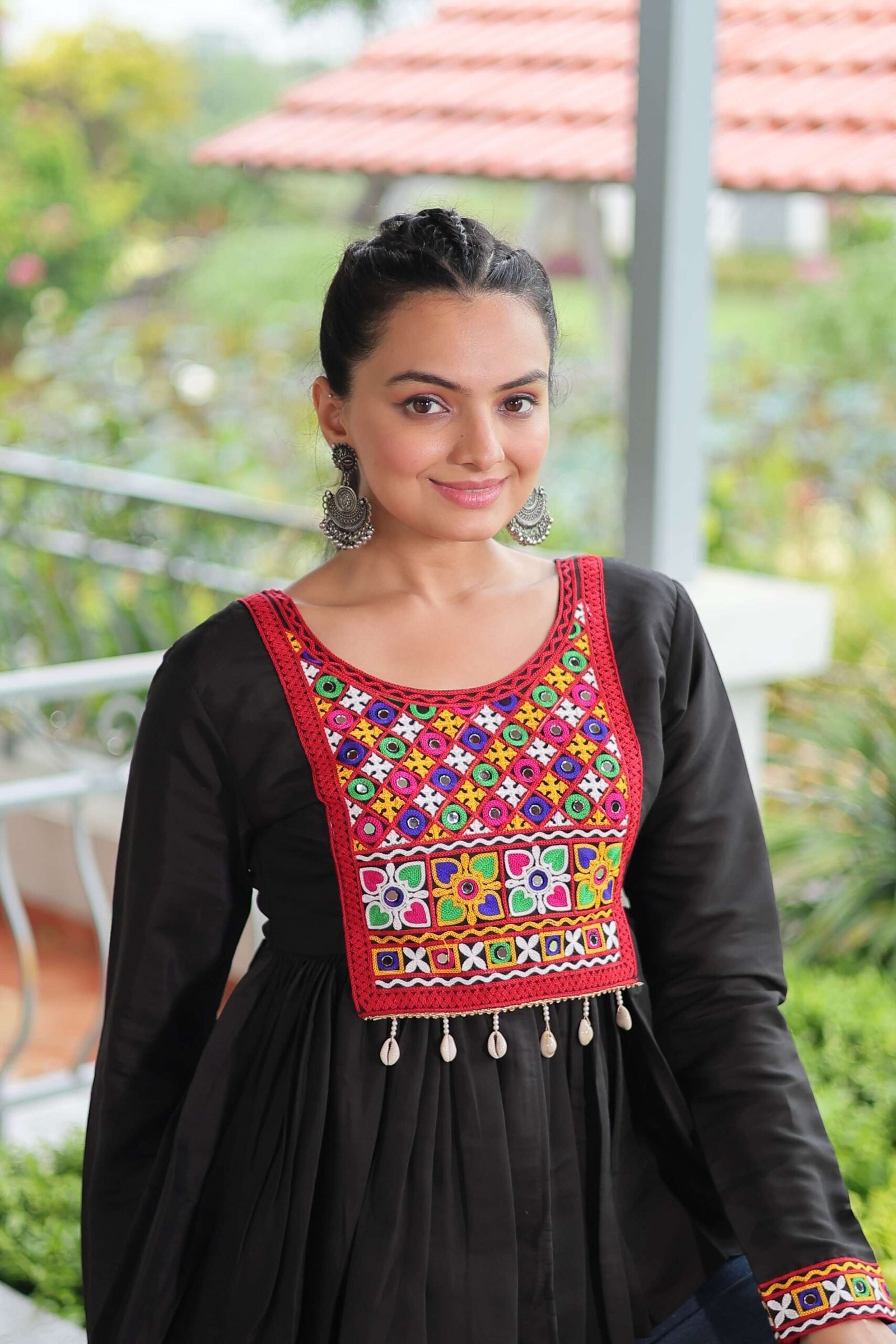Black Navratri Special Black Peplum Top in Roman Fabric with Kutchi Gamthi Work ? Festive Ethnic Wear