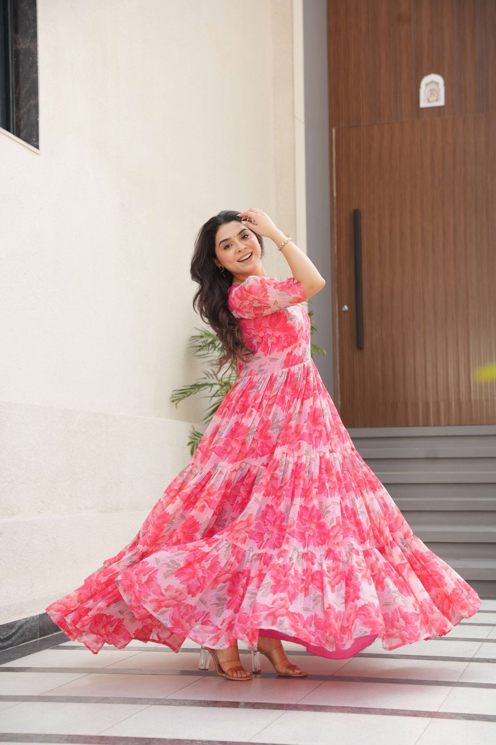 Peach Premium Faux Georgette Printed Gown ? Fully Flared & Elegant