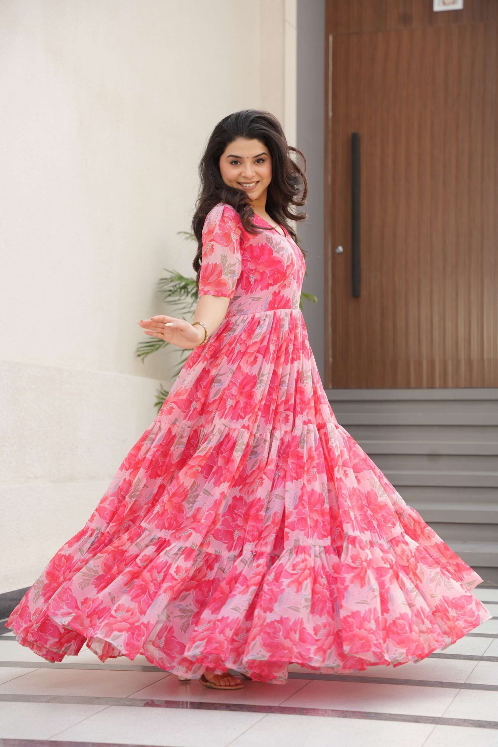 Peach Premium Faux Georgette Printed Gown ? Fully Flared & Elegant