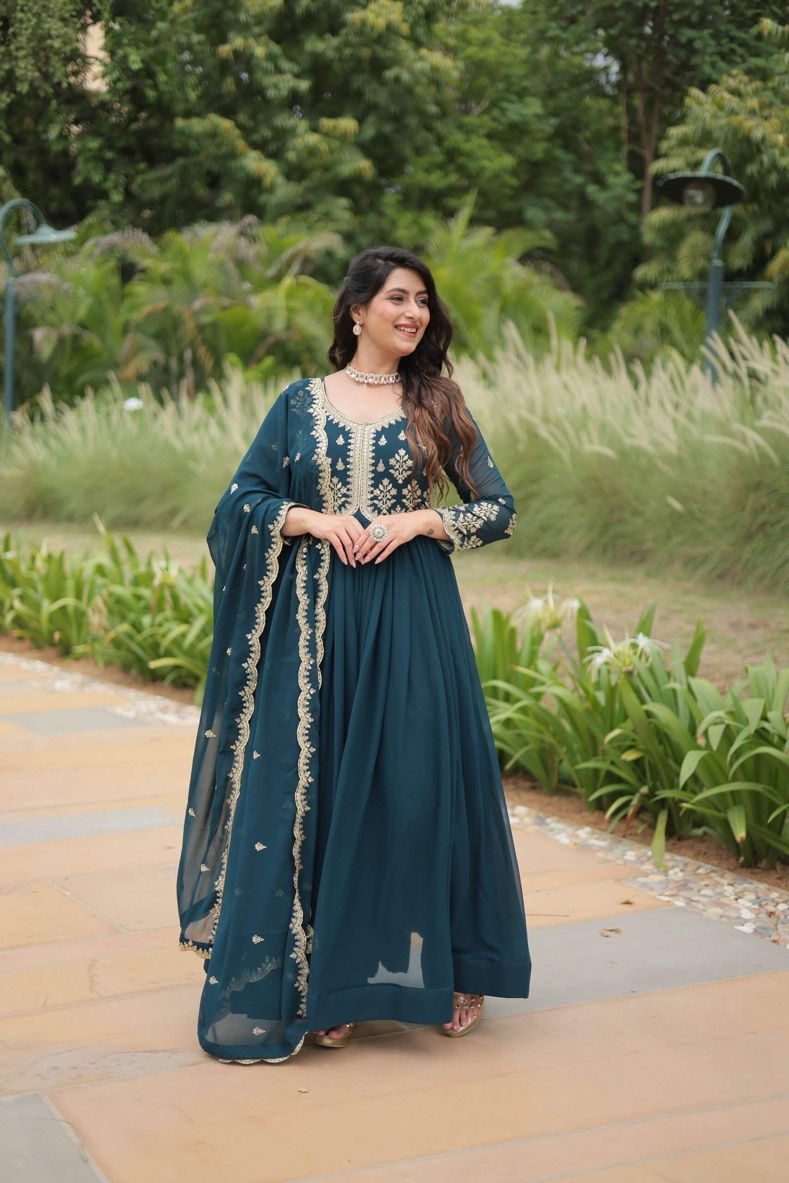 Teal-Blue Elegant Kutchi Gamthi Work Reyon Gown with Heavy Flair